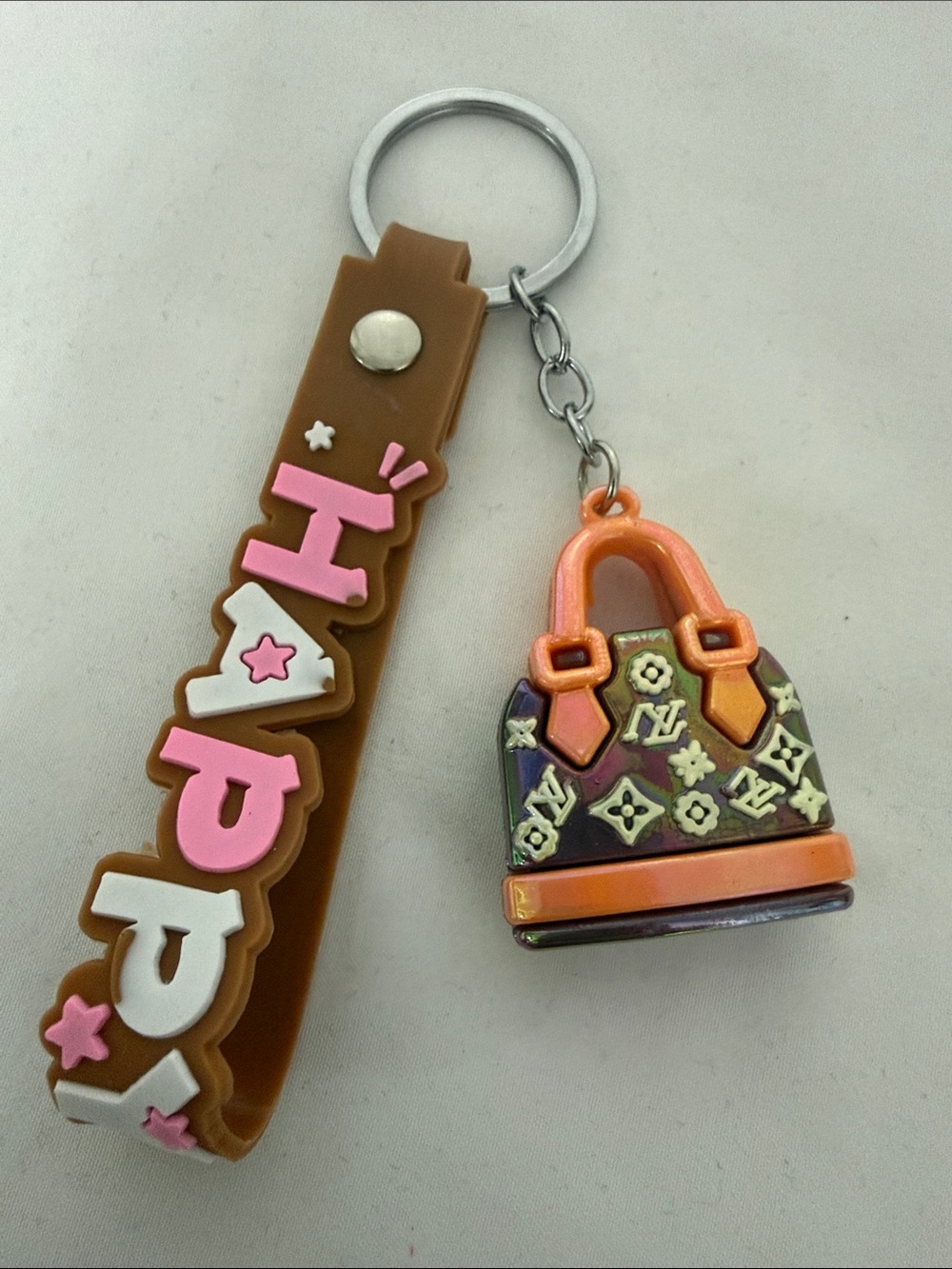 Brown and Pink 'HAPPY' Keychain with Orange Purse Charm